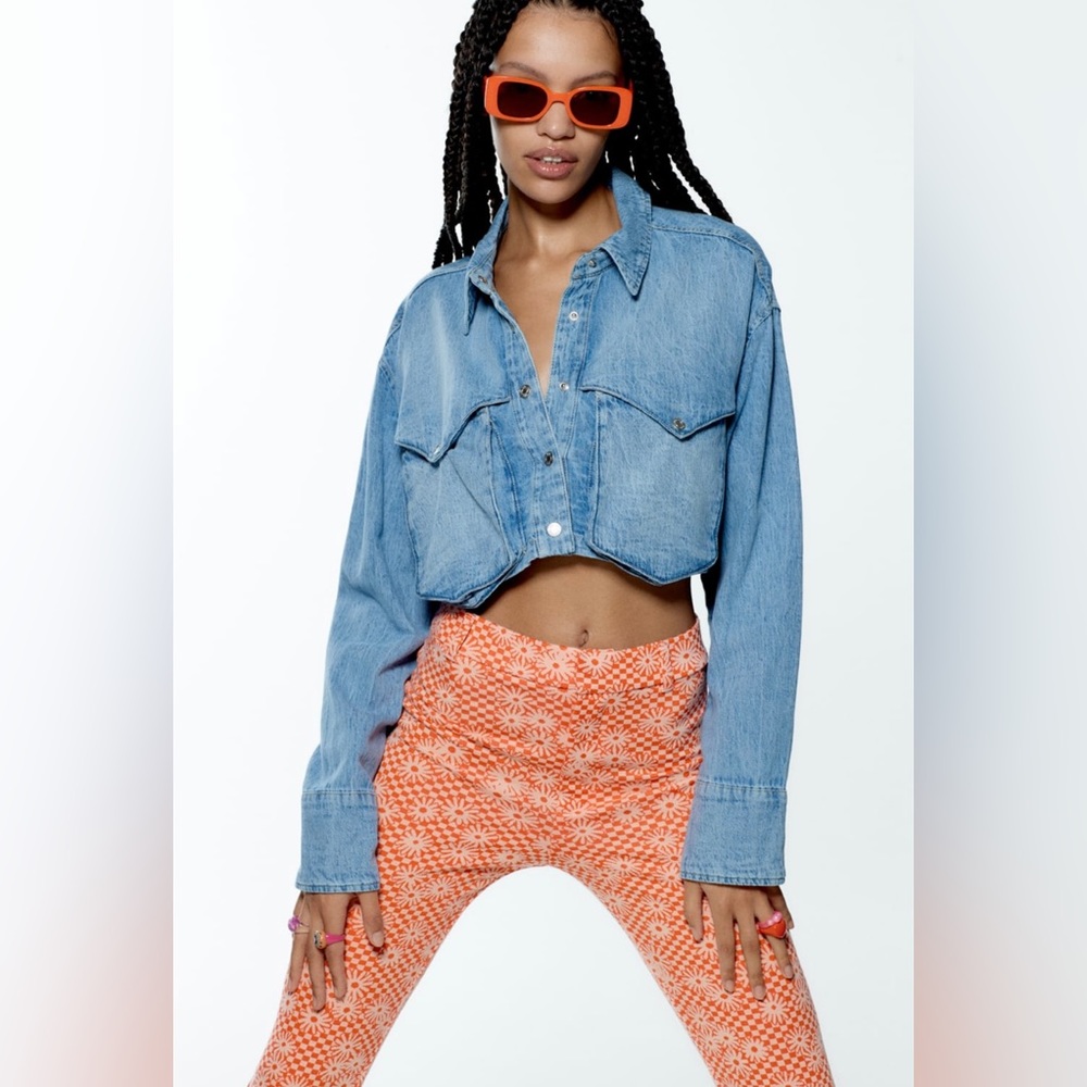 Orange daisy printed flare pants